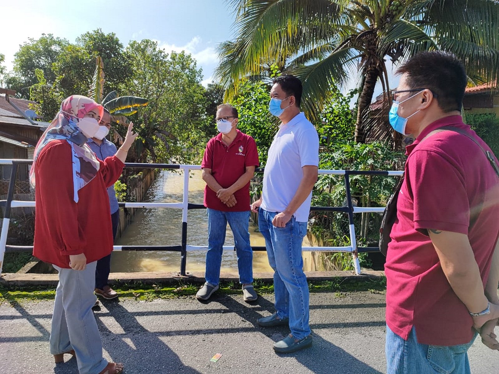 马口弄边路BHP油站前 桥下排水口或水灾肇因