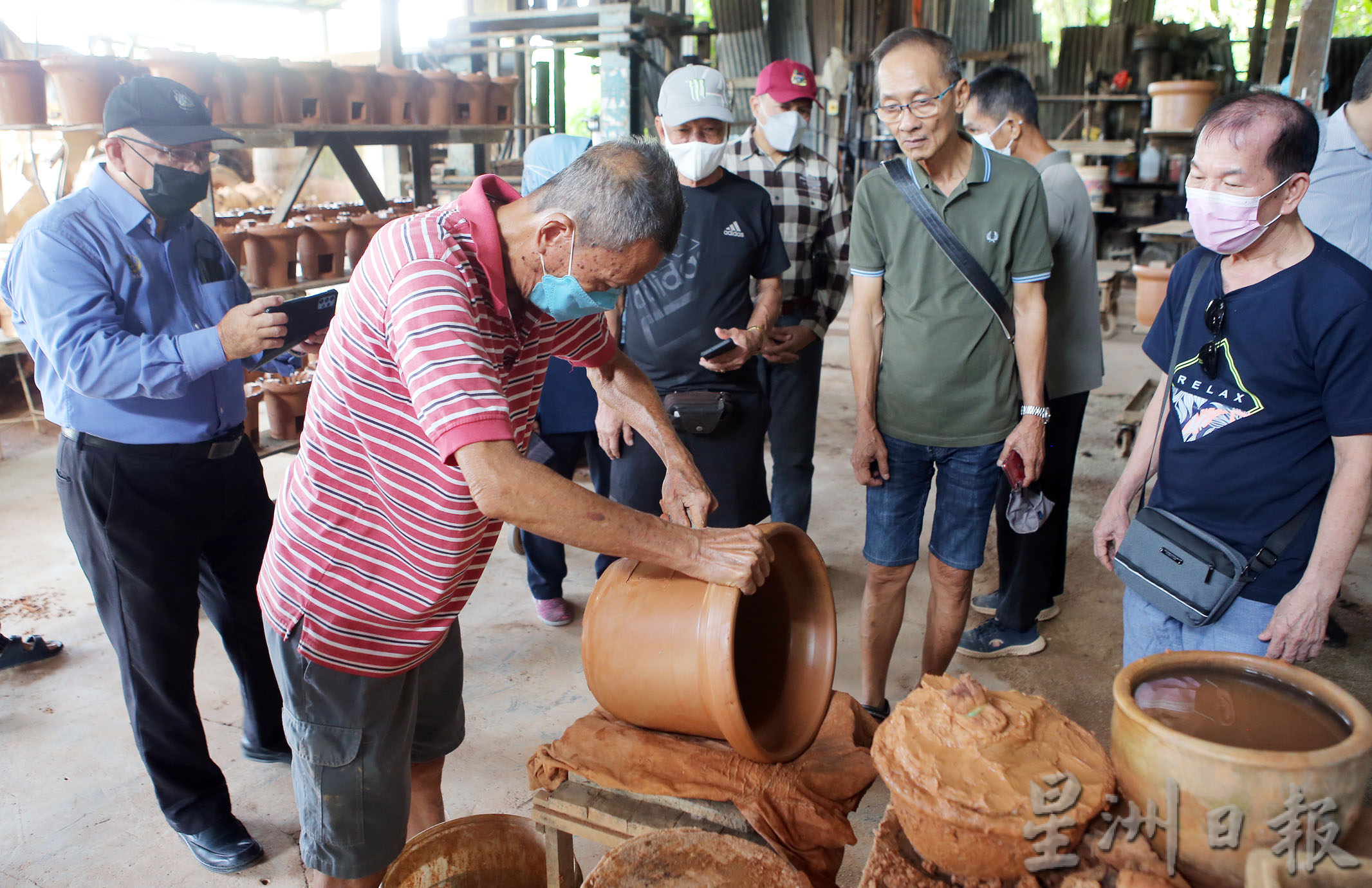 霹：备用版头／江沙路红炭炉工厂迎游客