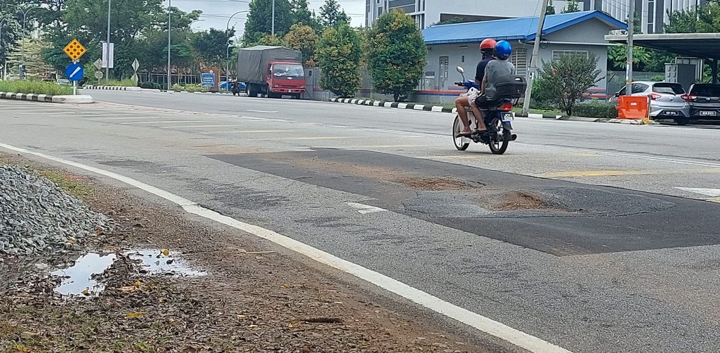 （古城封面副文）玛琳路短短距离路面破损累累