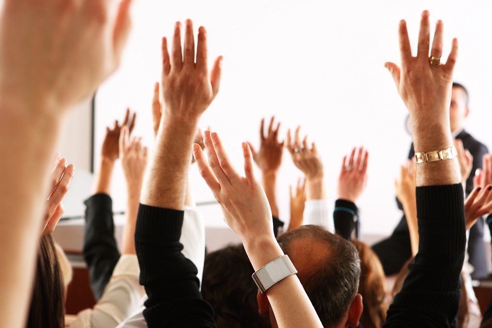 Large group of seminar audience in class room