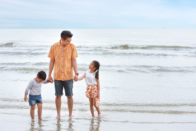 happy asian young single dad holding hand his children boy and g