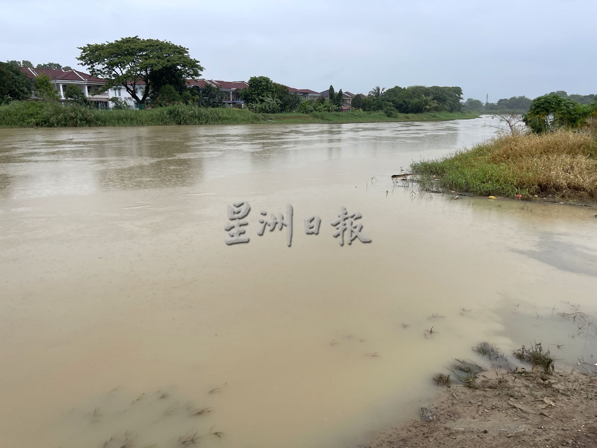 （古城第三版主文）河堤太低 ·罗舜生建议填高河堤