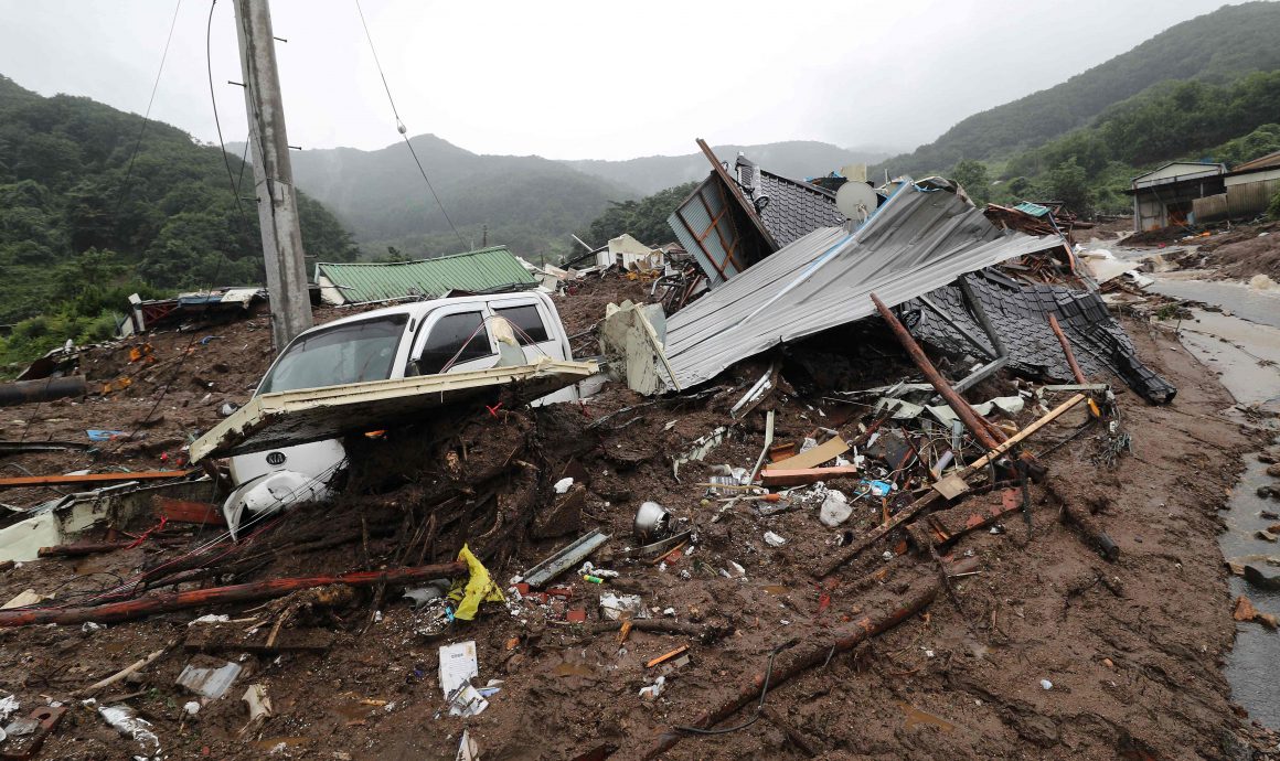 看世界主照换图说）韩国持续暴雨引发山体滑坡 20人死亡10多人失踪