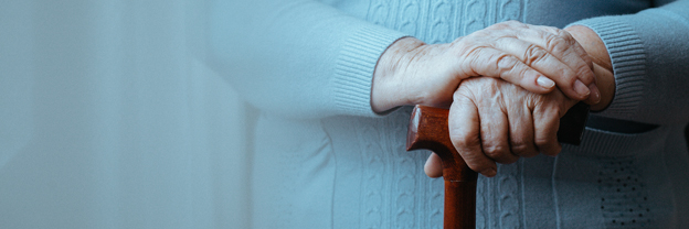 Hands of senior disabled woman