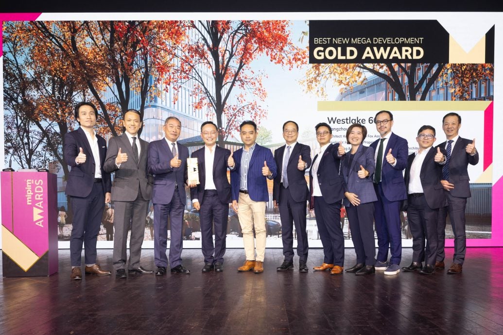 Mr. Kenneth Chiu, Executive Director and Chief Financial Officer (fourth left), Mr. Adrian Lo, Director – Project Management (third left), other executives of Hang Lung Properties and Westlake 66’s design consultants receive the Gold Award in the “Best New Mega Development” category at the MIPIM Asia Awards 2023