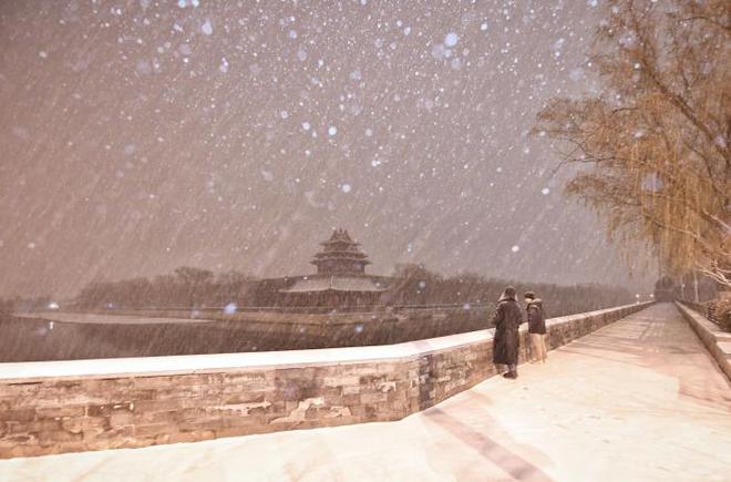 中国北方多地降雪降温 北京迎今年初雪