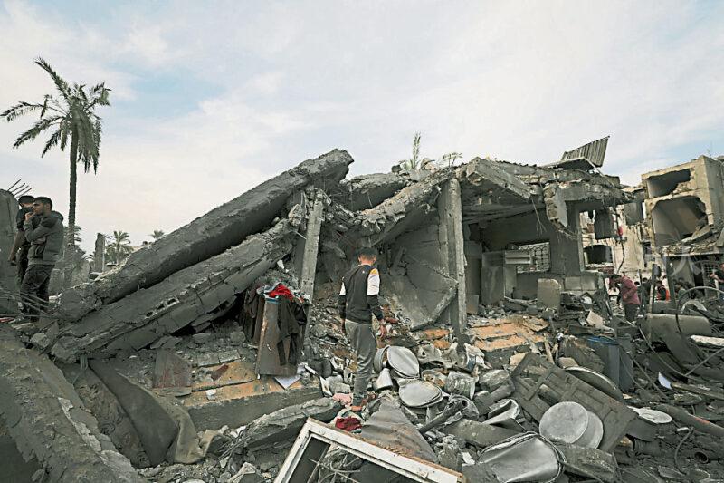 Palestinians search the rubble of destroyed homes as Israel continues to strike Gaza