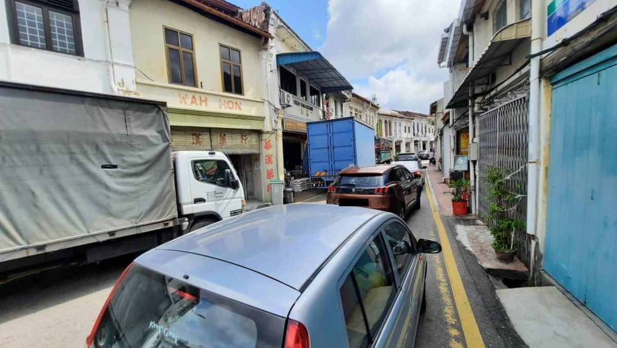 （古城第三版主文）勇全殿恳请商民游行当日，别在马车街及观音亭街停车