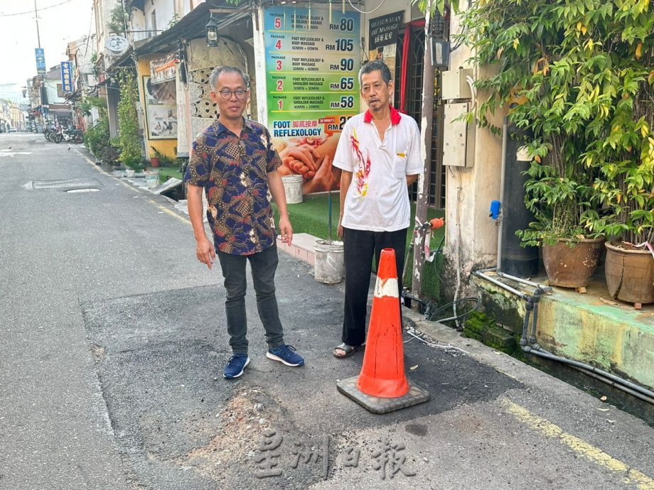 （古城第五版主文）荷兰街车流量高路洞一补再补 刘志俍促重铺道路