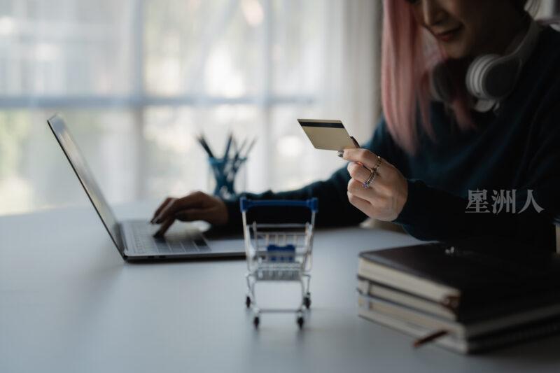 Young Person Using Credit Card And Laptop Computer. Online Shopping, E Commerce Concept