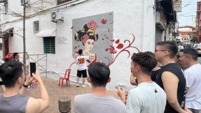 Artists from China and Malaysia completed a mural of Fan Bingbing at Jonker Walk