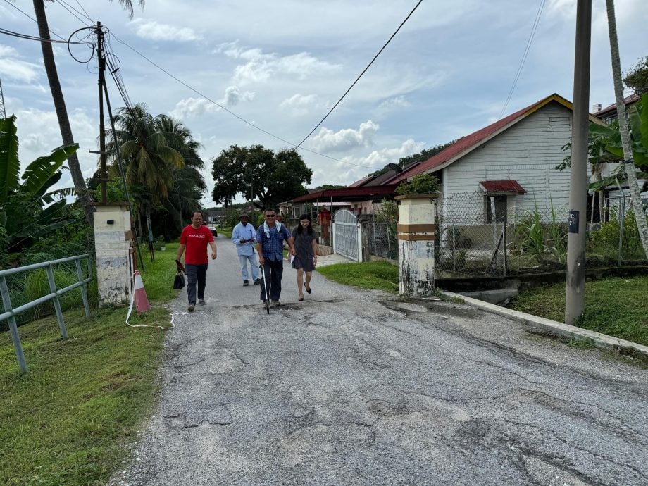 減輕民眾上坡辛苦 張哲敏撥5萬鋪醫院路