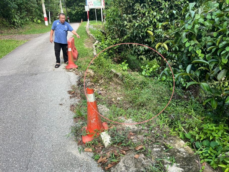 林明新路口道路崩塌半年未維修，休旅車閃路坑爆胎損失1300令吉。