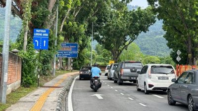 槟岛罗弄峇都兰樟   设路标 用对车道免塞车