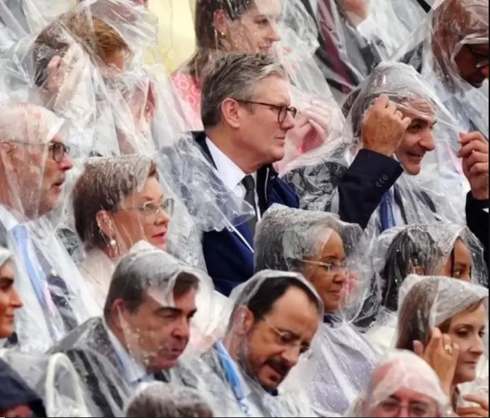 奥运开幕大雨把各国首脑淋成落汤鸡 英相雨中照疯传