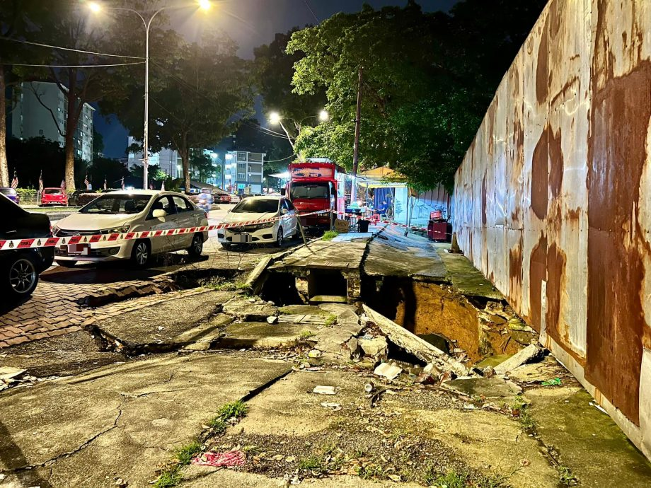 甘榜格灵芝一行人道地陷 市局已封锁现场