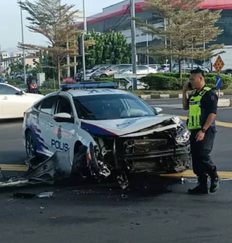 轿车撞警察巡逻车 警员左手臂遭割伤