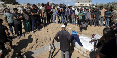 As Gaza death toll passes 40,000, corpses are buried in yards, streets, tiered graves