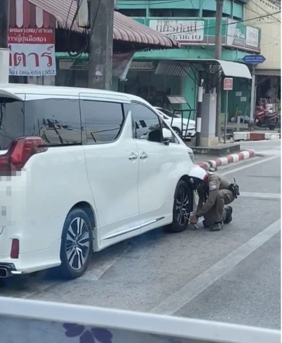 视频|自驾到合艾泊路旁被锁轮 网骂：坏习惯丢脸丢出国！