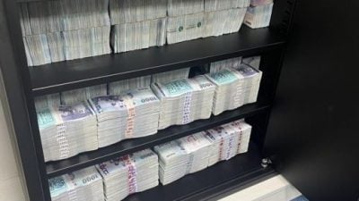 诈团吸金逾1亿 41人落网   近千万现金塞满保险柜