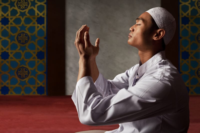 Asian Muslim Man Praying In Mosque