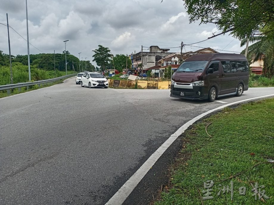 大都会/黄智荣建议设限高杆解决道路损坏