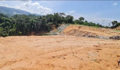 3地主用泥土蓋垃圾山 暫阻隔毒煙冒出