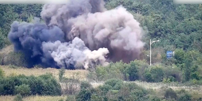 North Korea blows up parts of inter-Korean road and rail links in a symbolic display of anger