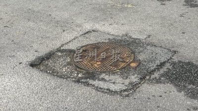 增江新花园道路窨井盖投诉 | 大都会报道获重视  英达丽水已维修窨井盖