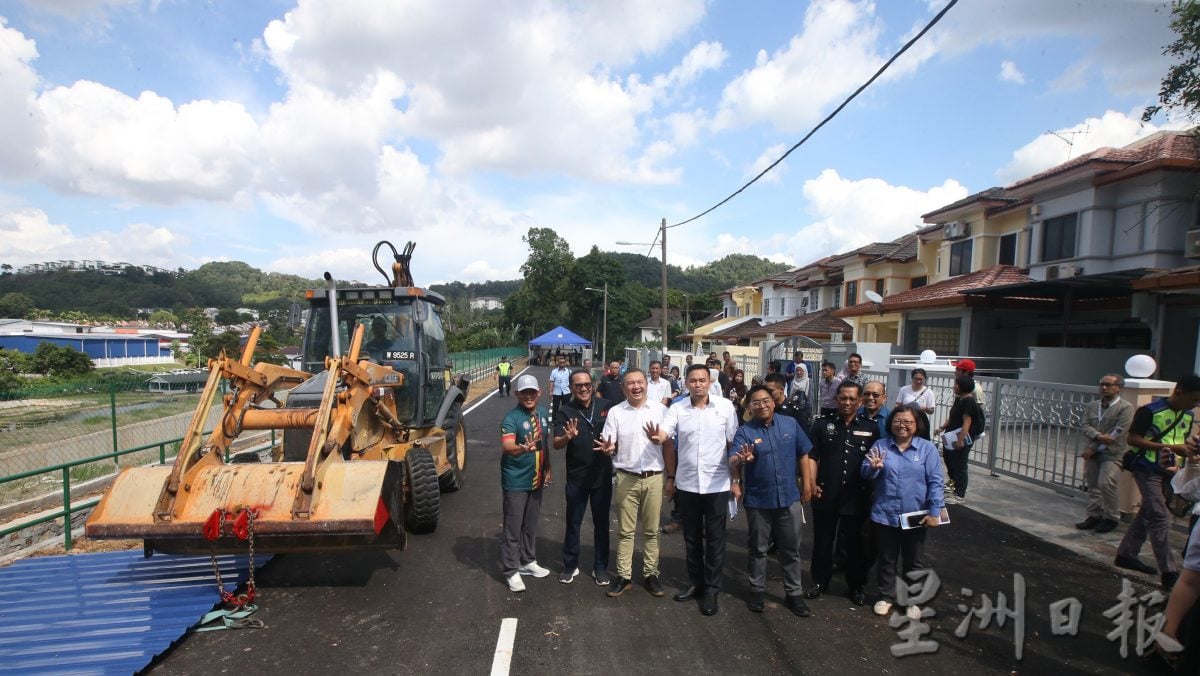 耗资1212万令吉修复 发展商承担全数经费 离家近1年灾黎终得重返家园