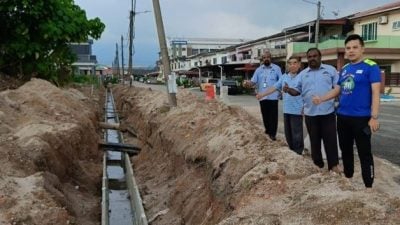 太平市会斥资5万 第一花园建排水沟解决积水