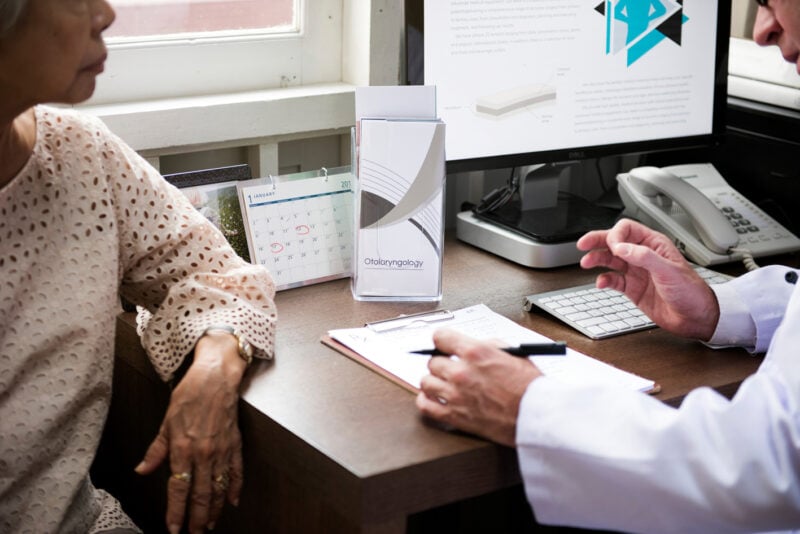 An Elderly Patient Meeting Doctor At The Hospital