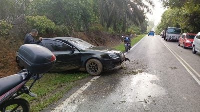 雙白線超車不遂   轎車撞貨櫃羅裡釀2傷