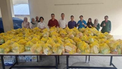 “爱心满溢护华校”抵道北灾区   700粮食包派丹华校生