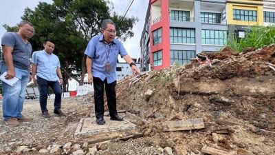 广利银行路/拿督阿邦阿都拉欣路辟路工程 . 转移地下公用事业设施耗时长