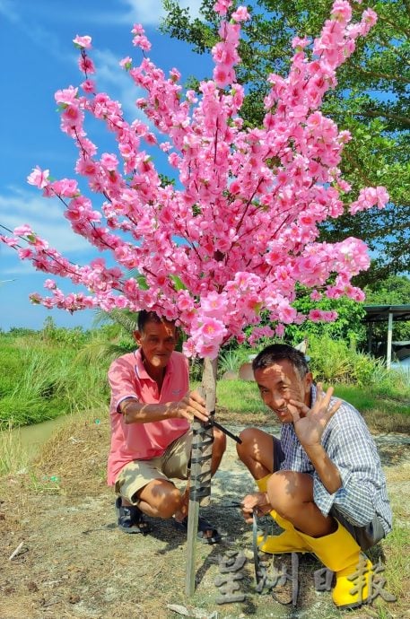 村民义务总动员 水闸新村春意浓