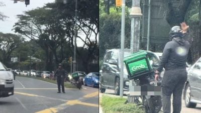 送餐员冒雨助疏导交通 车主上传视频感谢：他帮了很大忙