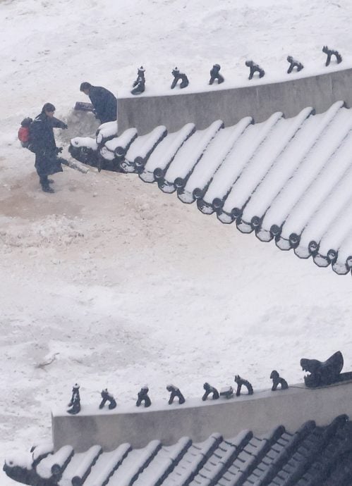 韩国首都圈及江原地区普降大雪 政府启动一级响应