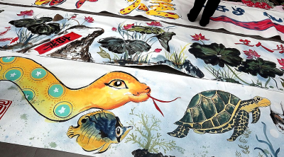 2,025-ft paper scroll with snakes to usher in Year of the Snake