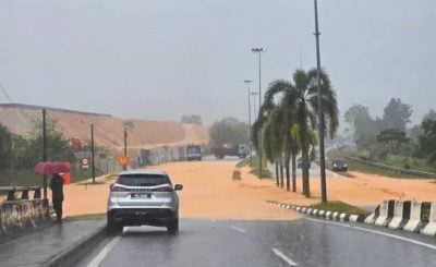 居林高科技工业园   雨后黄泥水淹大路民宅