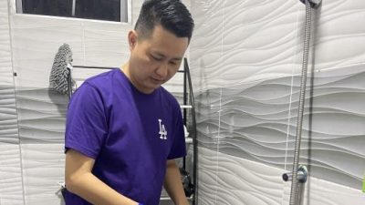 林思健支持张健仁建议 . 水灾援金应提高至3千