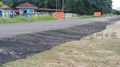 重铺路 路墩“隐身”酿祸 没画警示线 骑士撞及坠河伤